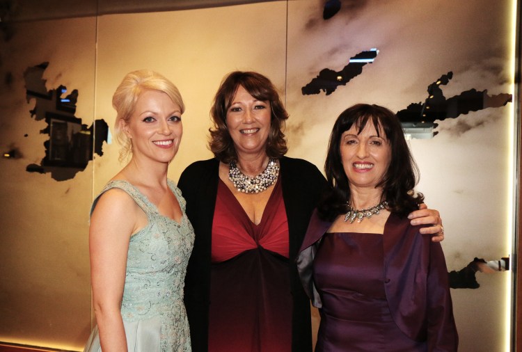 A Lovely Photo of three ladies wider